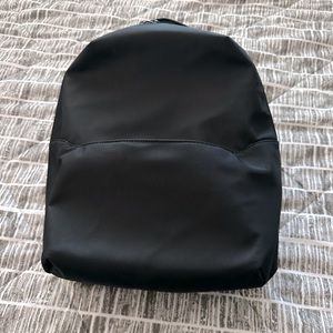 AWAY the everywhere zip BACKPACK color black